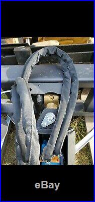 Skid steer auger attachment with 3 bits