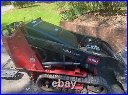 TORO DINGO TX427 with bucket and BOXER ML1100-13 auger attachment with9 and 12